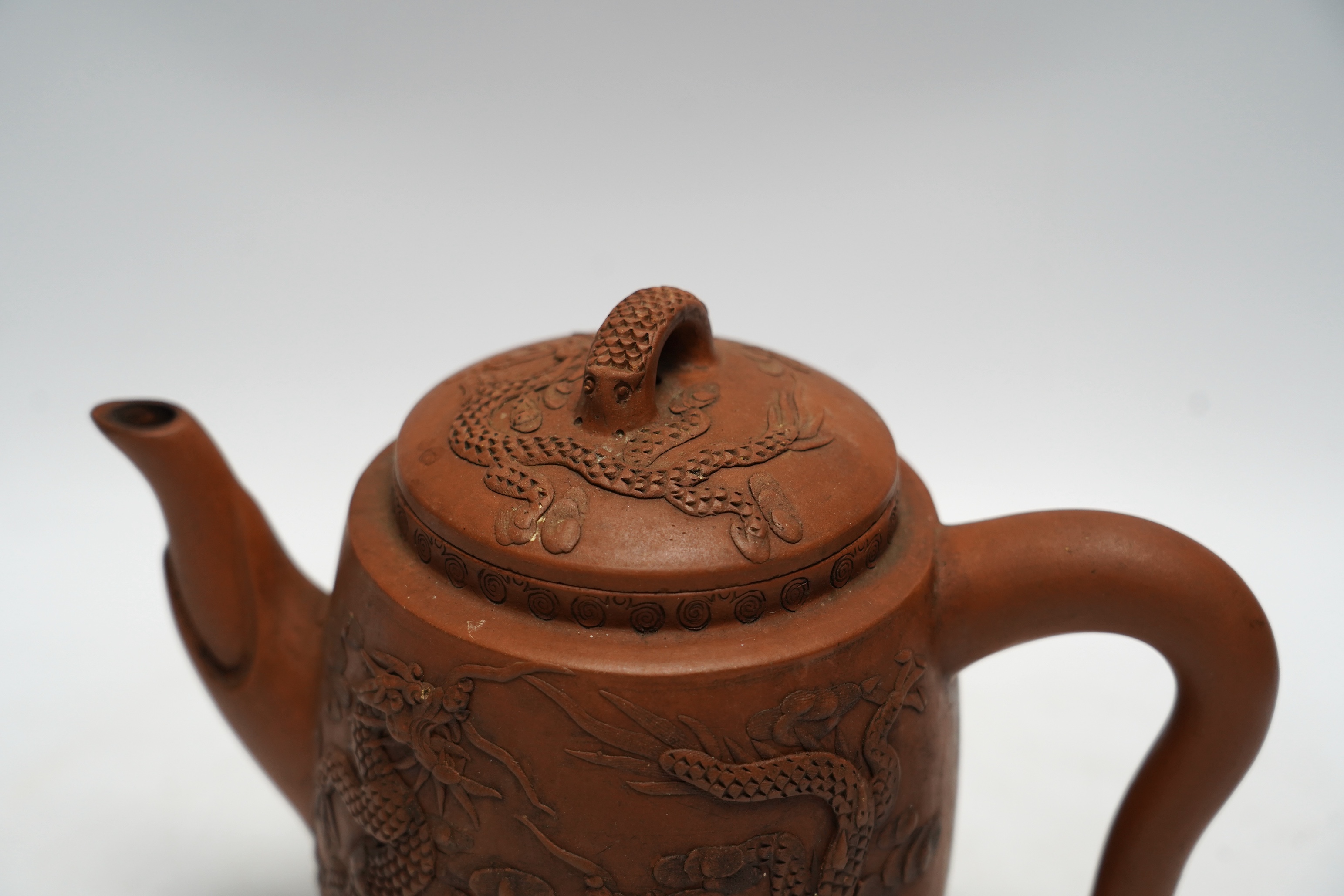 A Chinese Yixing ‘dragon’ teapot, 18cm high